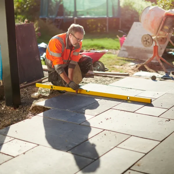 Deck Building vs. Patio Installation: Costs, Materials, Maintenance Requirements, Design Options, and Property Value Comparison